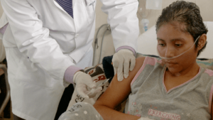 Patient being treated in a Guatemalan clinic